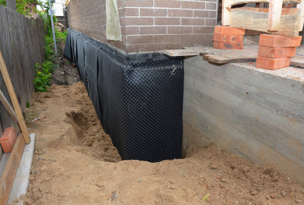 SJ Waterproofing Pros technician performing targeted Waterproofing assessment in Stanley, NC